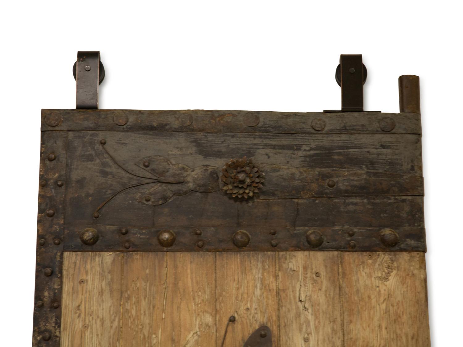 A Pair of Continental Iron Mounted Weathered Oak Doors — 19th Century