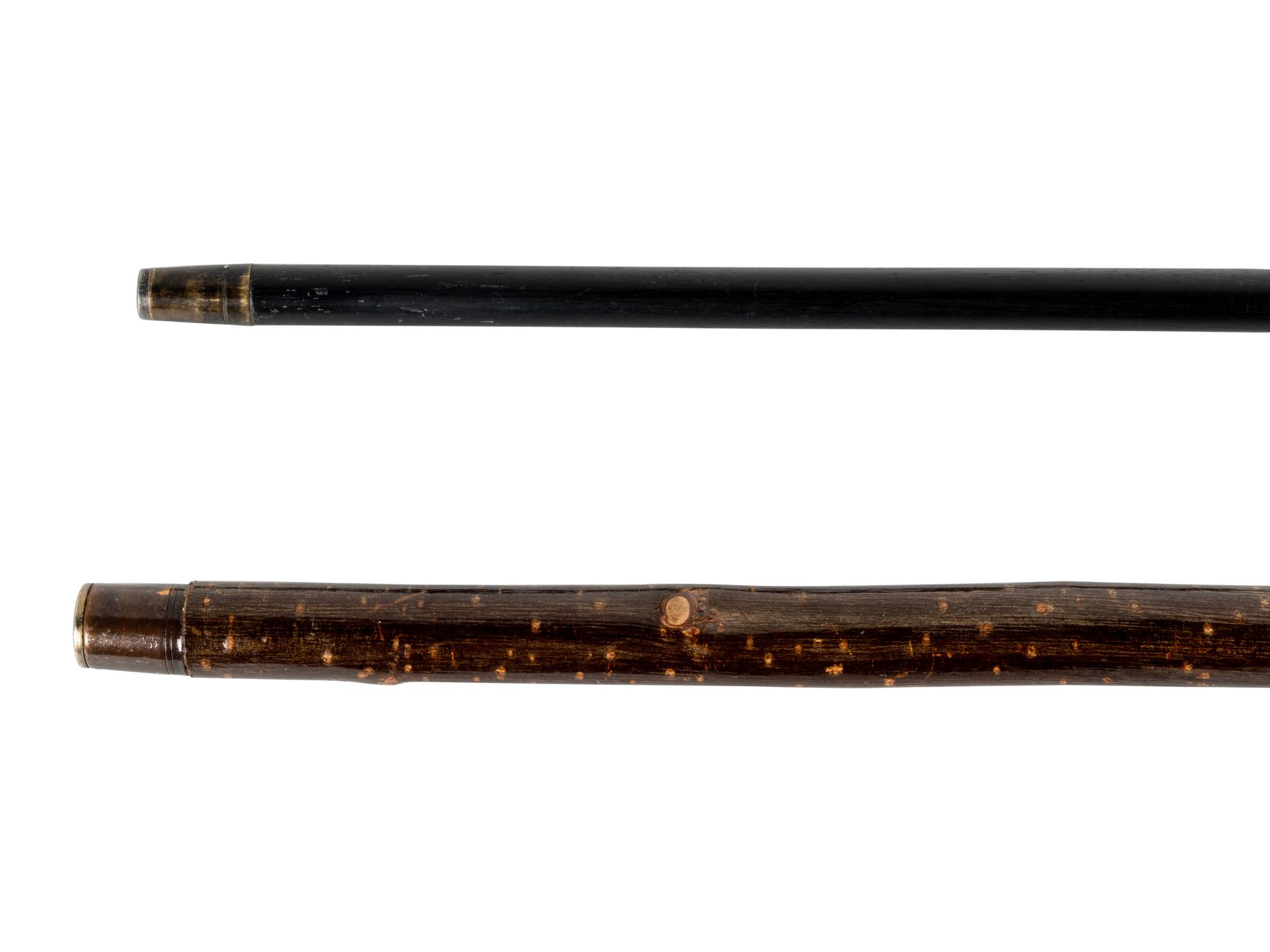 Two Figural Walking Sticks or Canes