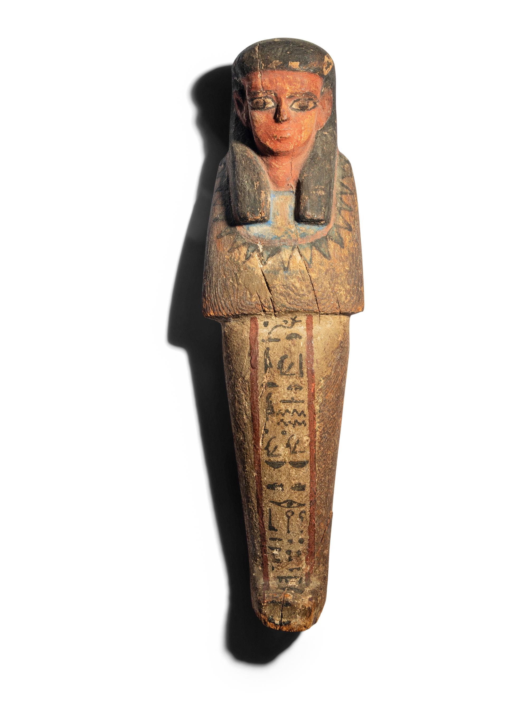 An Egyptian Style Painted Wood Figure