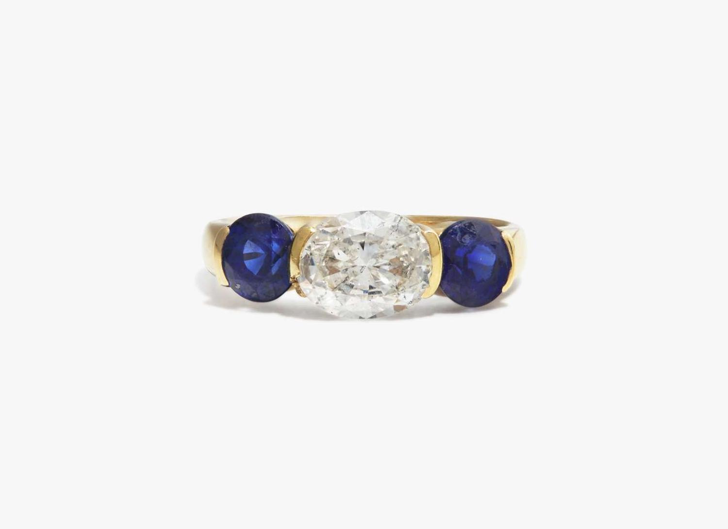 A Three-Stone Diamond and Sapphire Ring