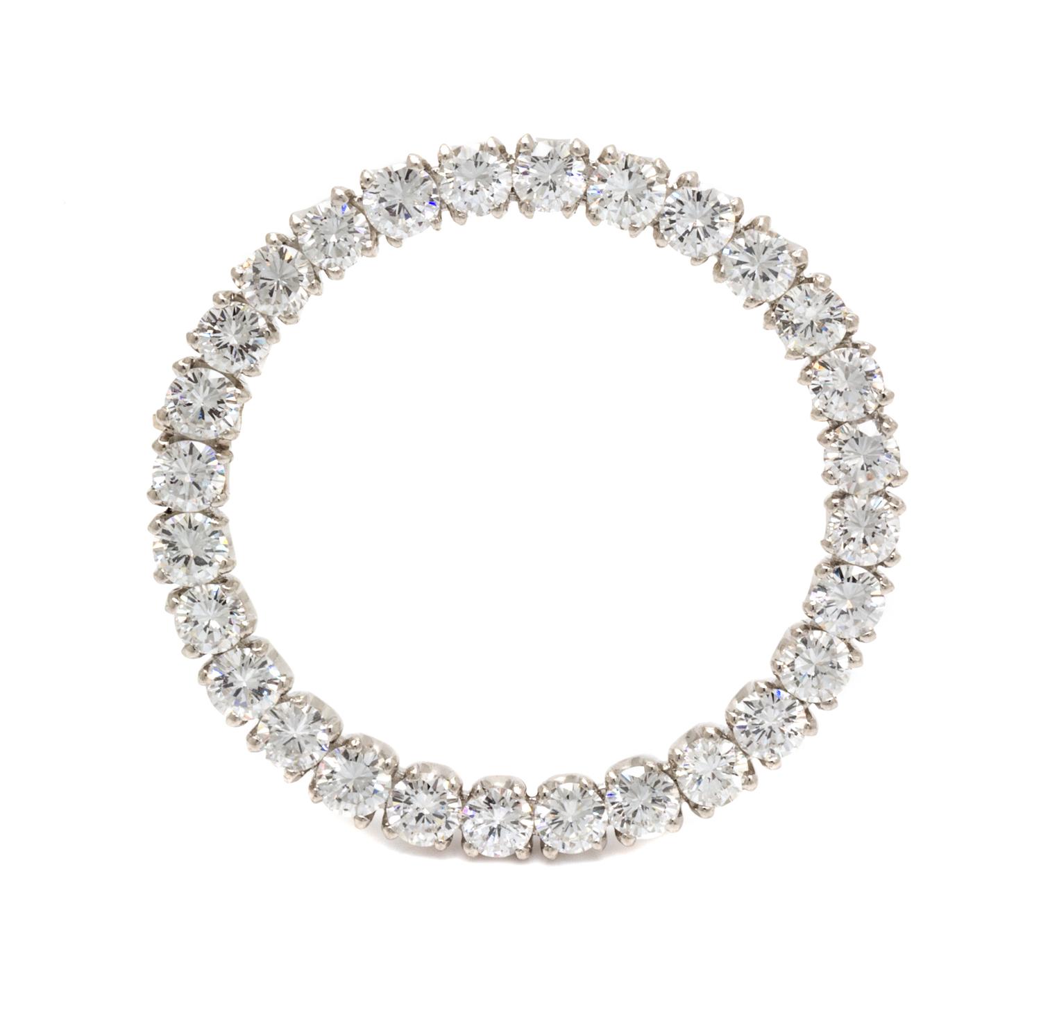 A Platinum and Diamond Circle Brooch, 6.90 dwts.