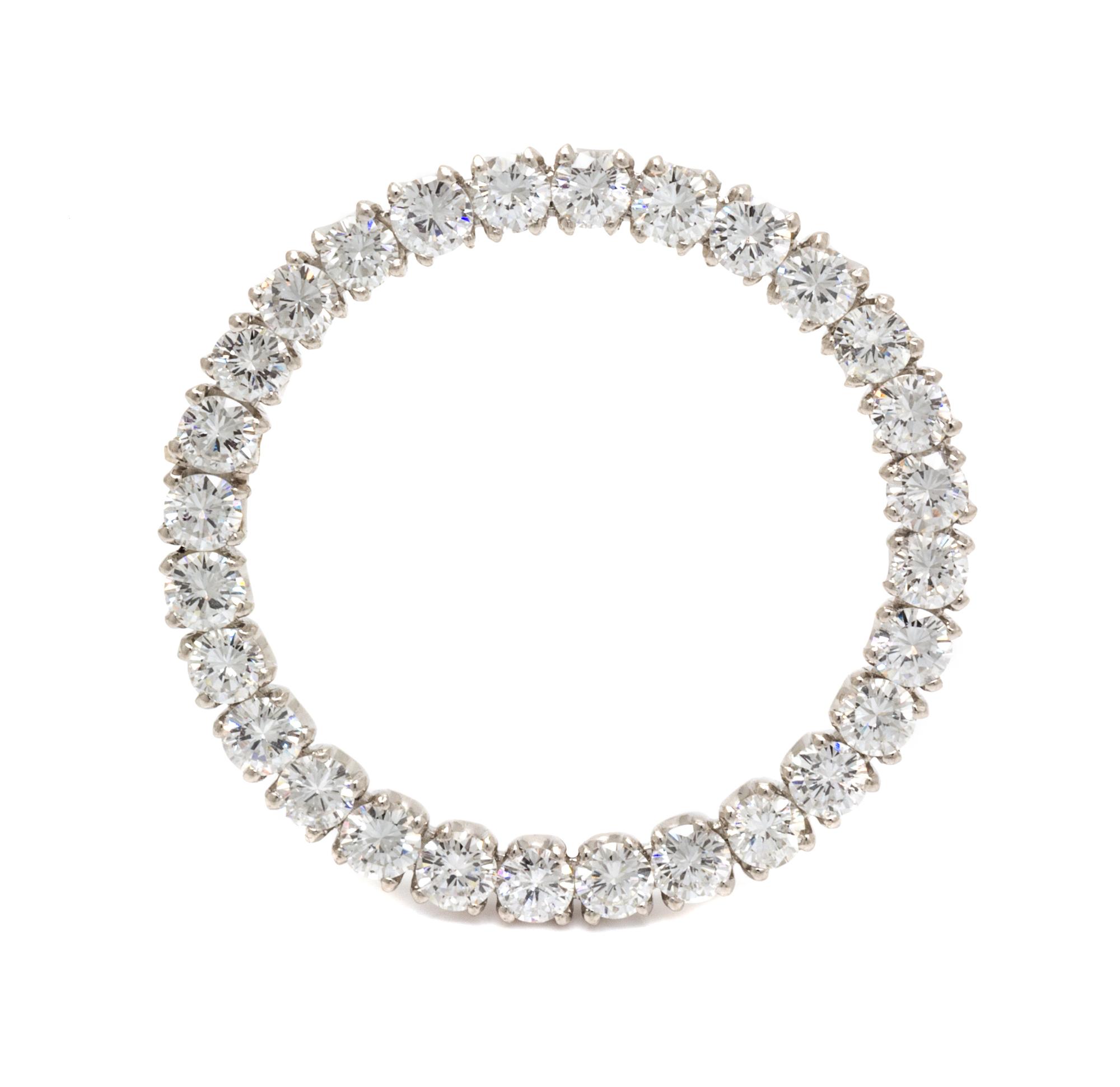 A Platinum and Diamond Circle Brooch, 6.90 dwts.