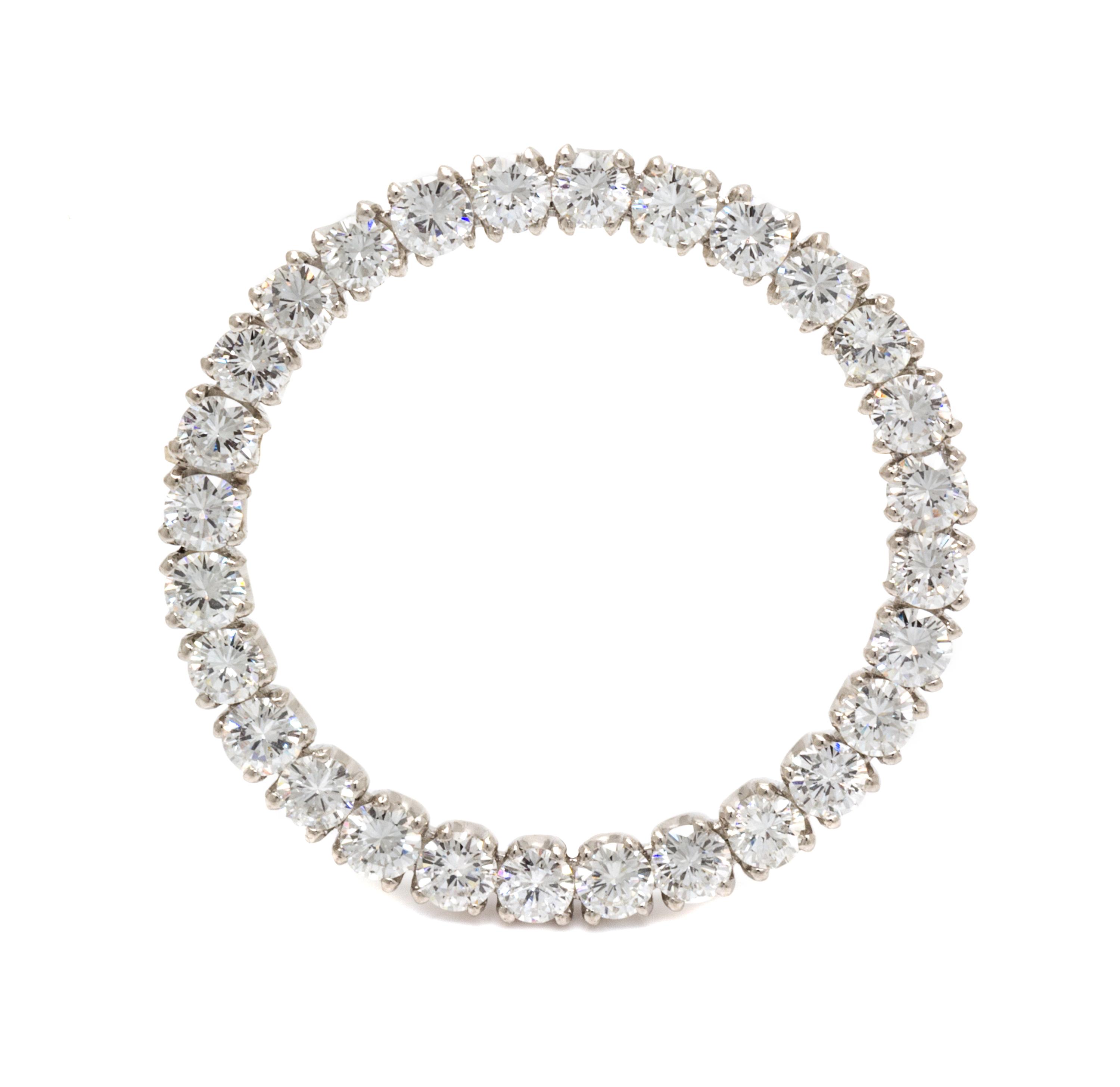A Platinum and Diamond Circle Brooch, 6.90 dwts.