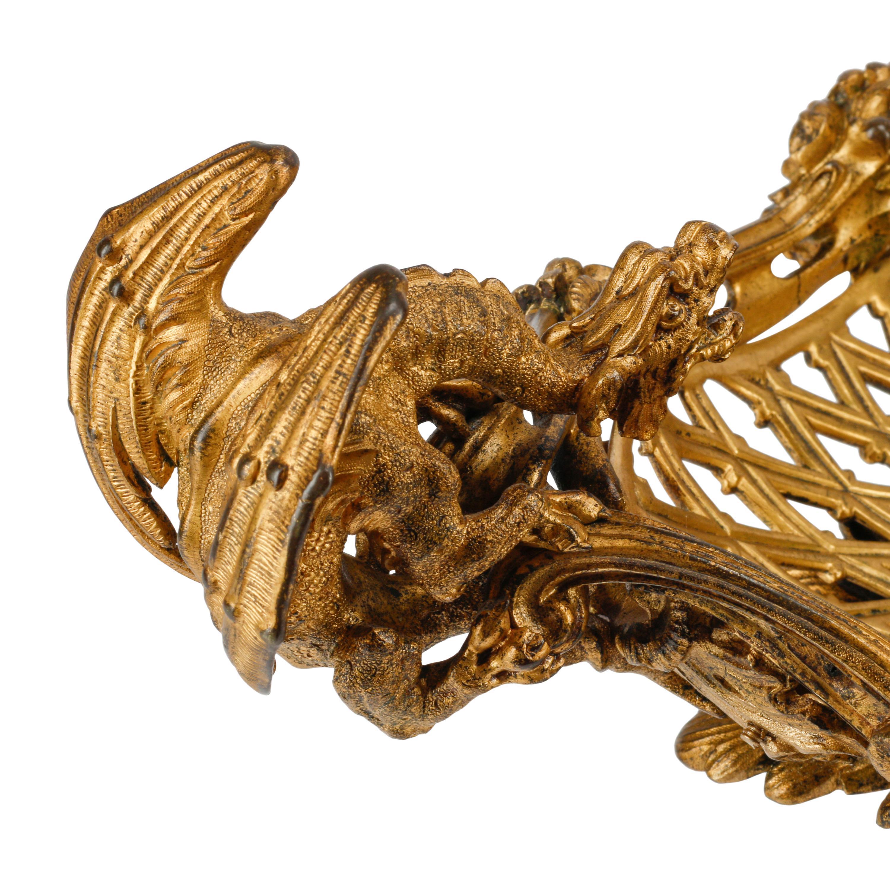 A Pair of French Gilt Bronze Figural Centerpieces