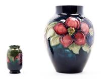 Two Moorcroft Pottery Vases Height of first 5 inches.