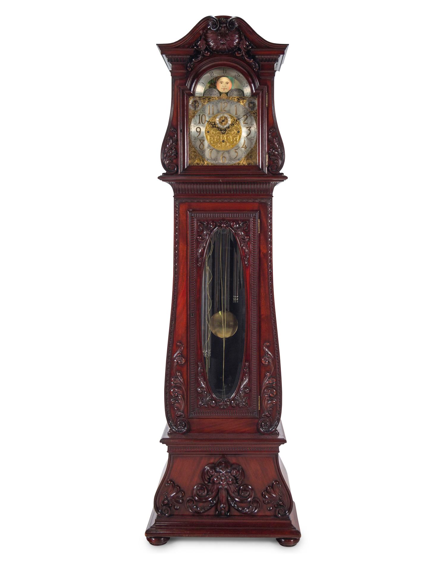 A Herschede Carved Mahogany Nine-Tube Tall Case Clock