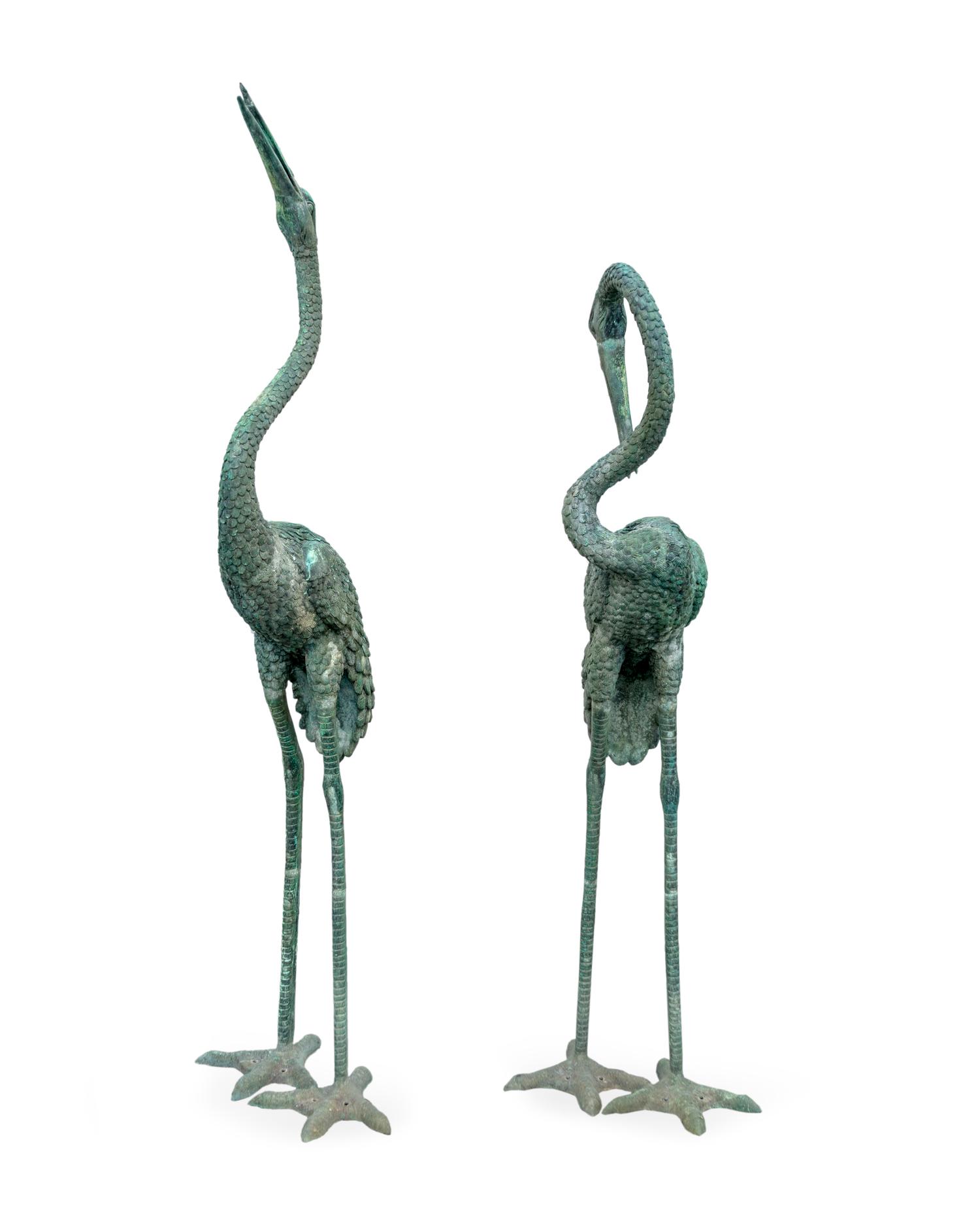A Pair of Bronze Models of Cranes — 20TH CENTURY