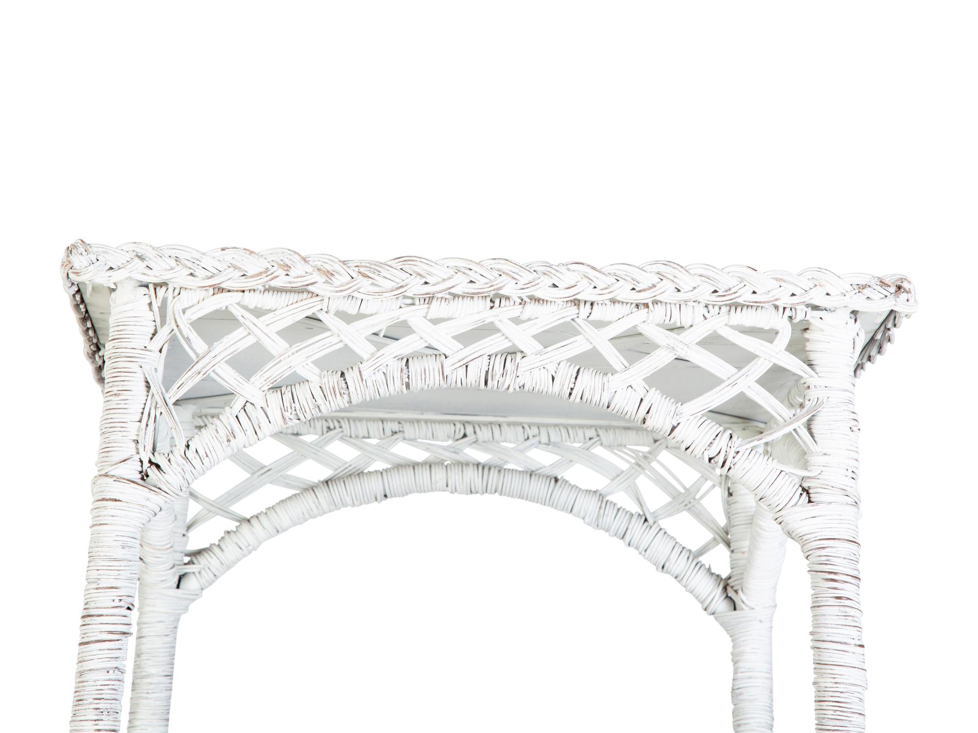 A Pair of White Painted Wicker Etageres — EARLY 20TH CENTURY