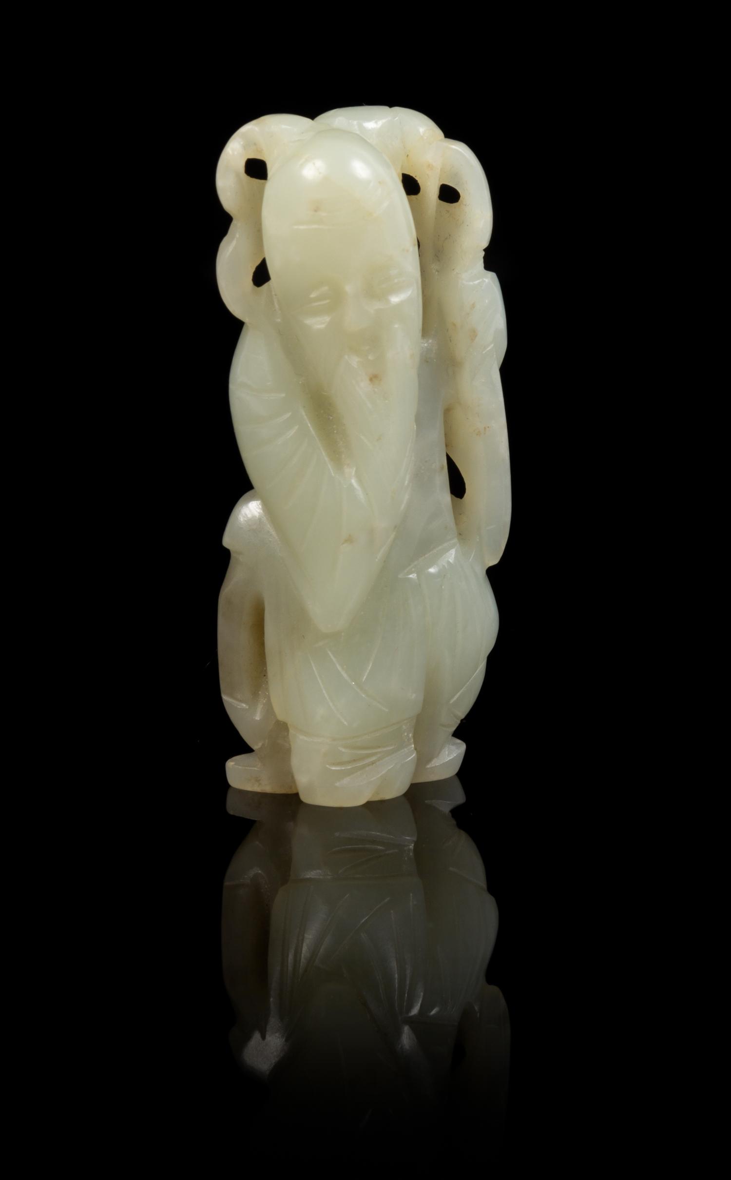 A Carved Jade Toggle Height of jade 2 1/2 inches.