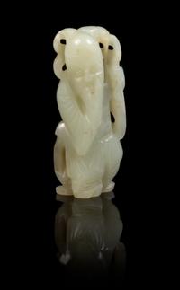 A Carved Jade Toggle Height of jade 2 1/2 inches.
