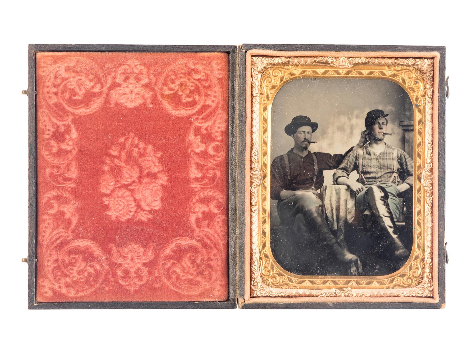 [CIVIL WAR]. Quarter plate tintype featuring a playful portrait of identified 7th Iowa Infantry pards in Corinth, MS.