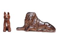 A Glazed Sewer Tile Recumbent Lion Doorstop