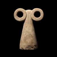 A Mesopotamian Stone Spectacle Idol