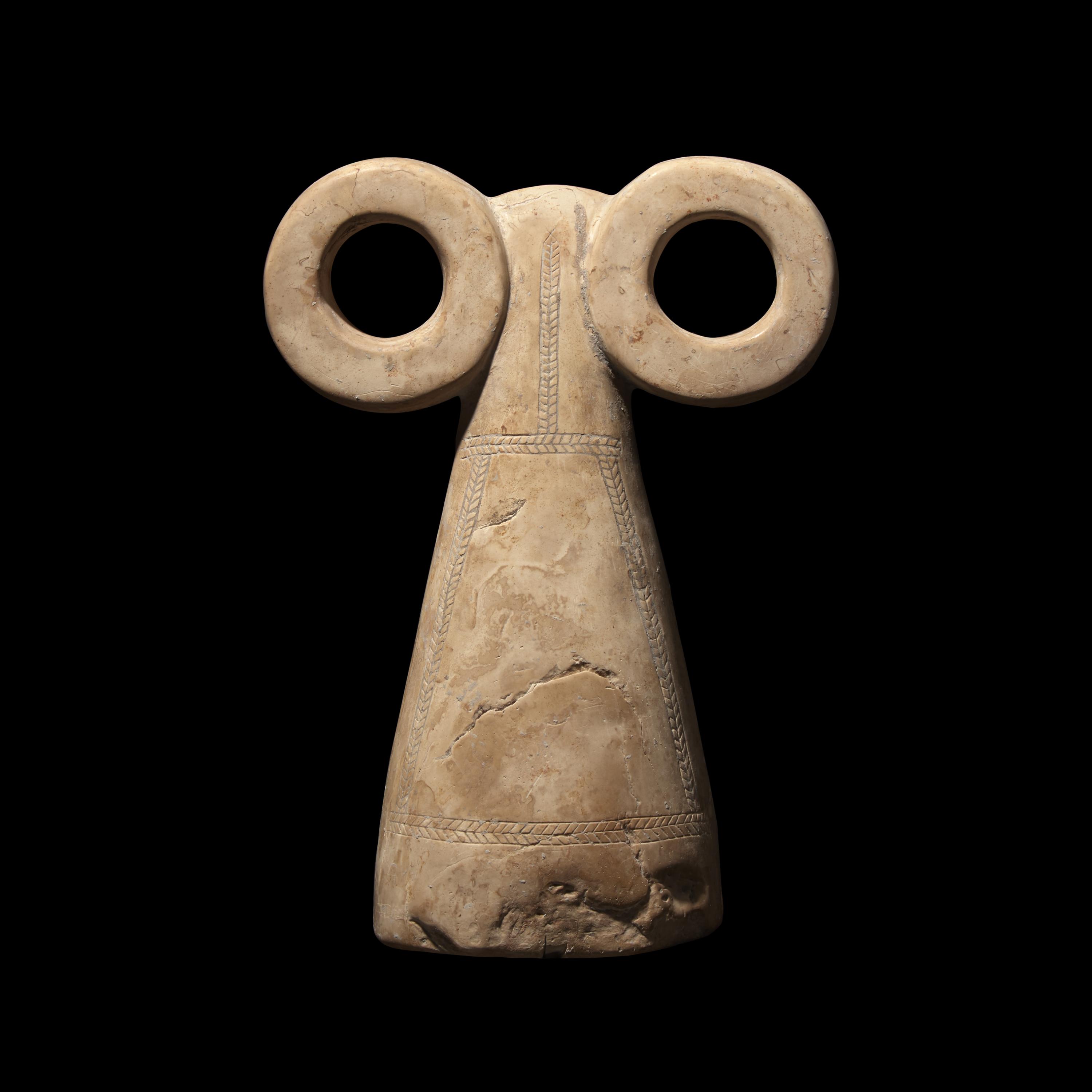 A Mesopotamian Stone Spectacle Idol