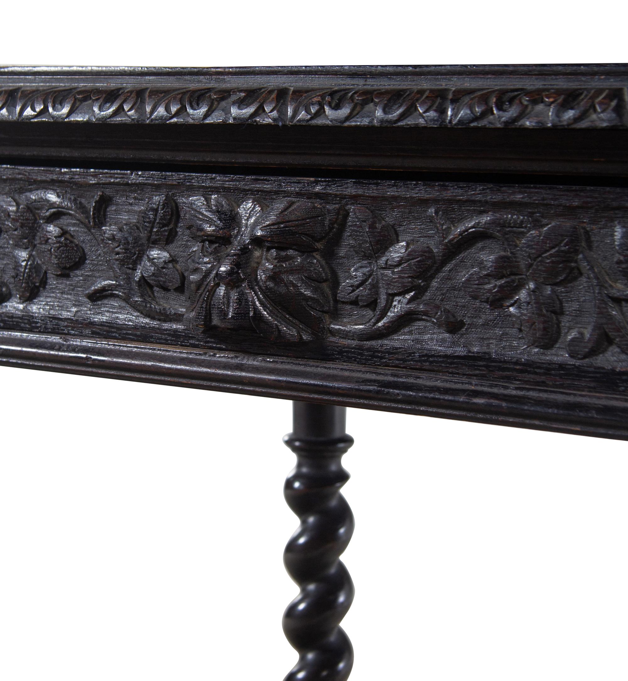 A Renaissance Revival Carved Walnut Table