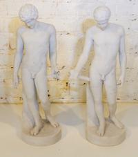 Two Marble Neoclassical Figures. Height 19 1/4 inches.