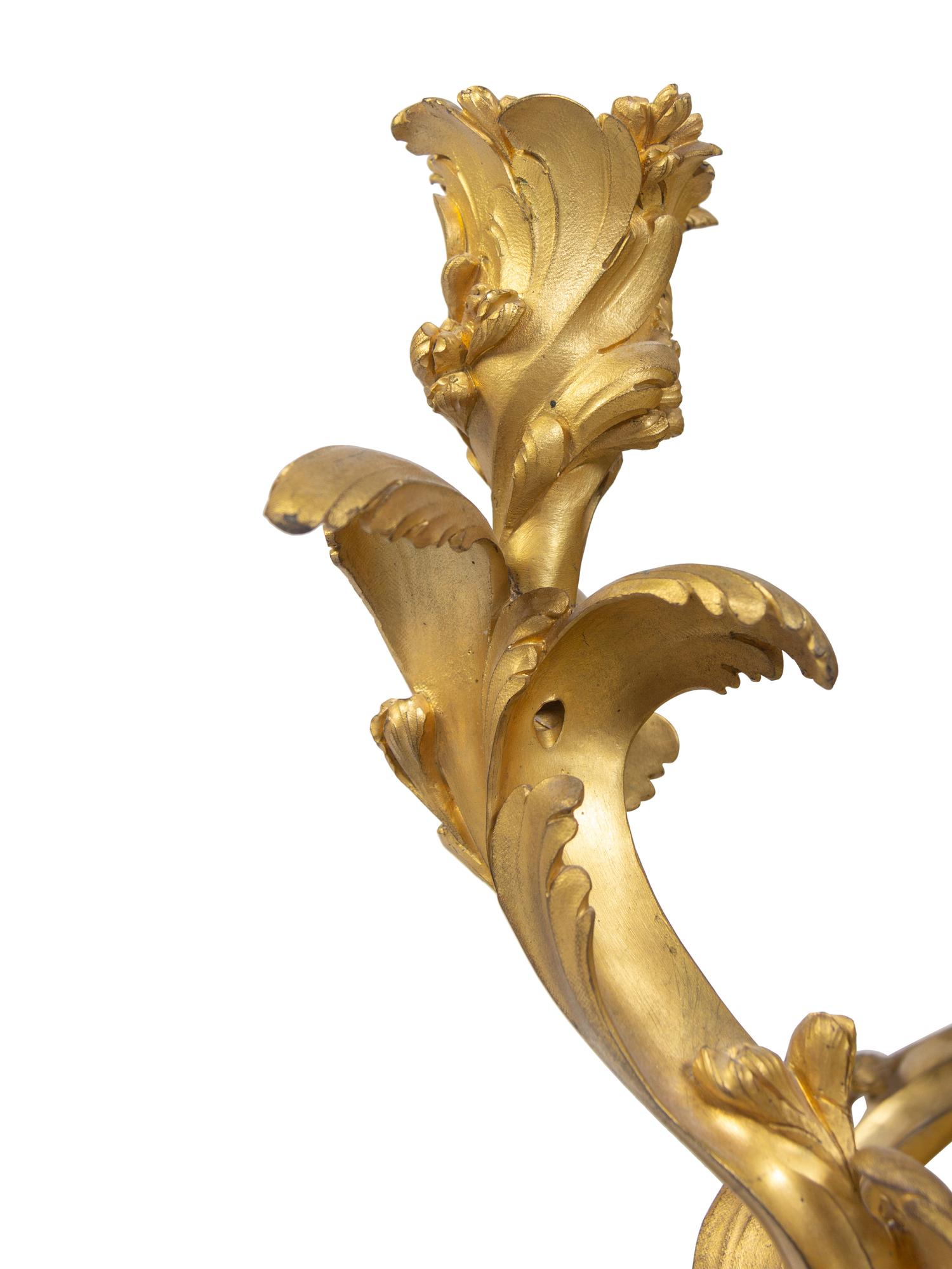 A Pair of Louis XV Gilt Bronze Three-Light Wall Sconces