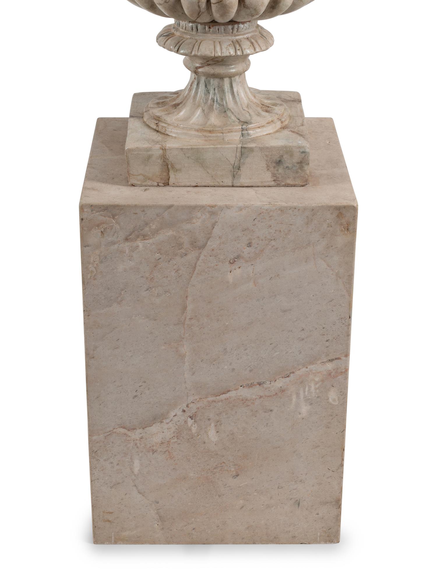 A Pair of Neoclassical Style Faux Marble Painted Terracotta Urns and Stone Plinths