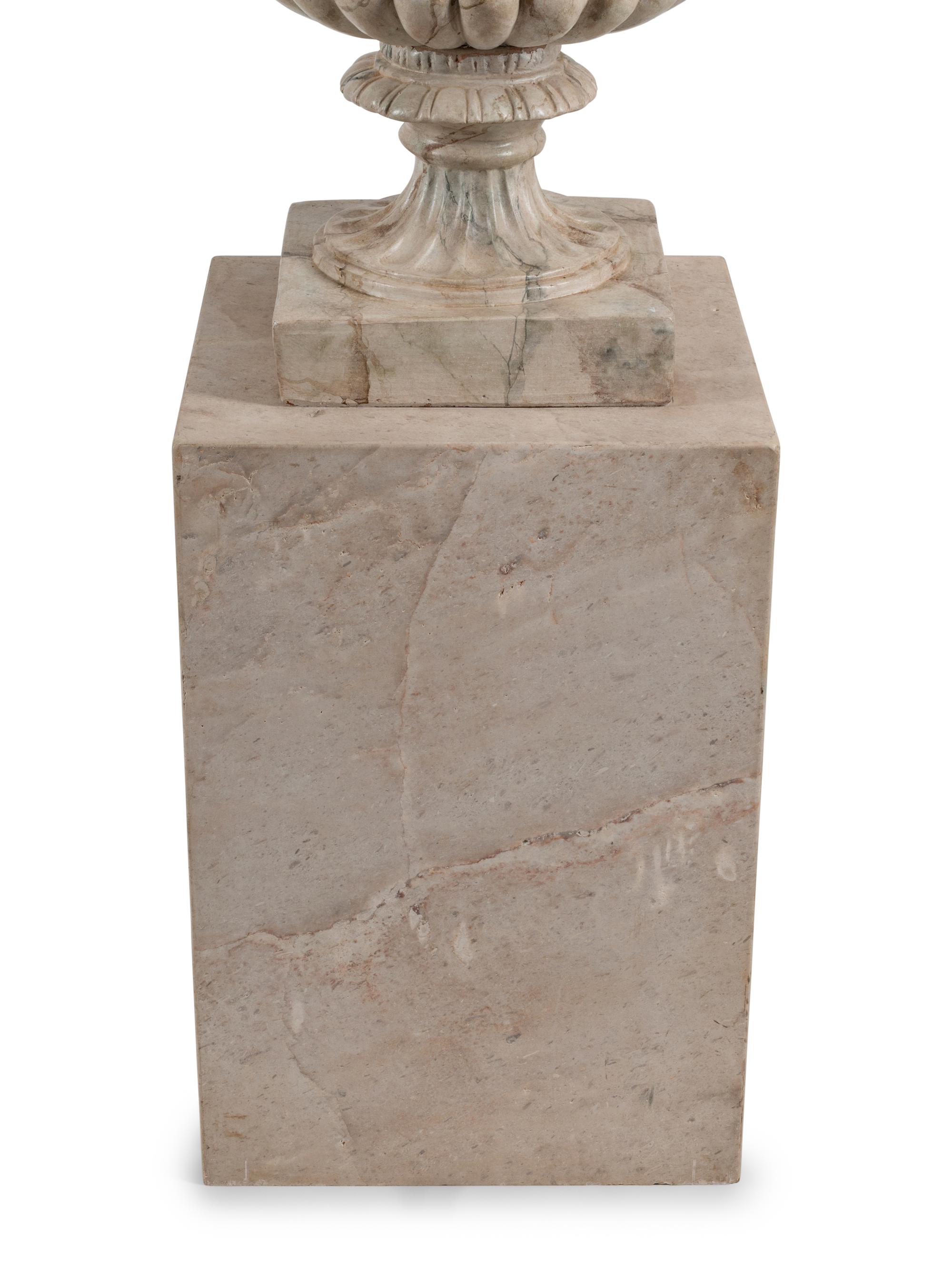 A Pair of Neoclassical Style Faux Marble Painted Terracotta Urns and Stone Plinths