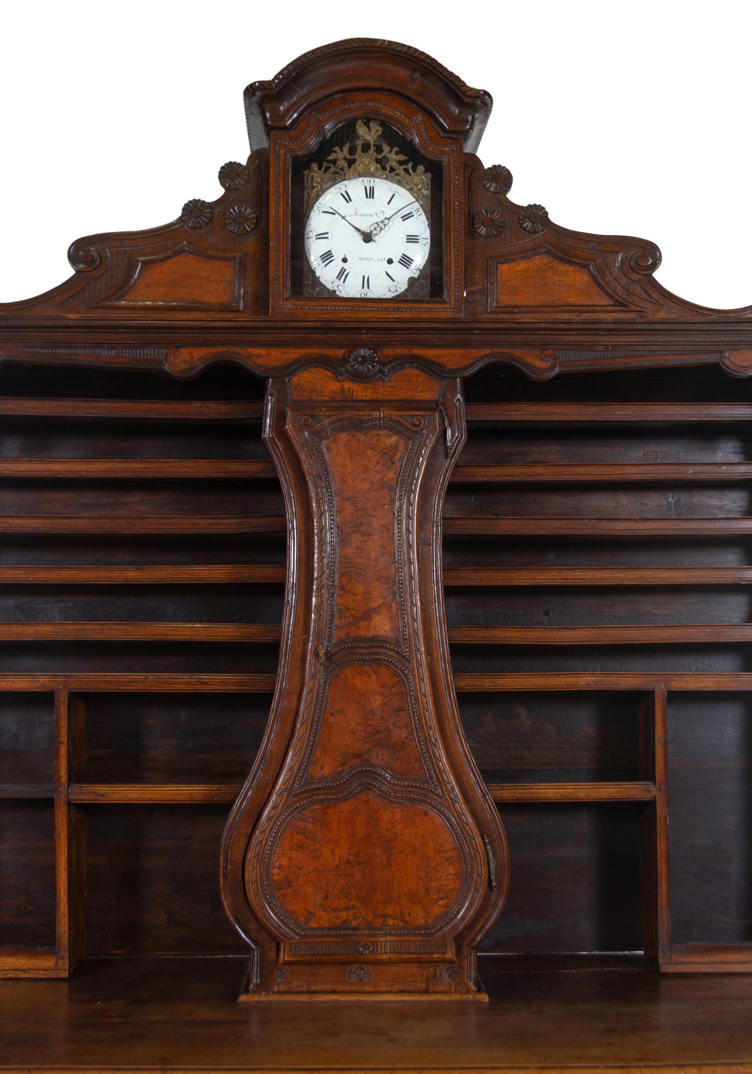 A French Provincial Burlwood Clock-Inset Serving Cabinet