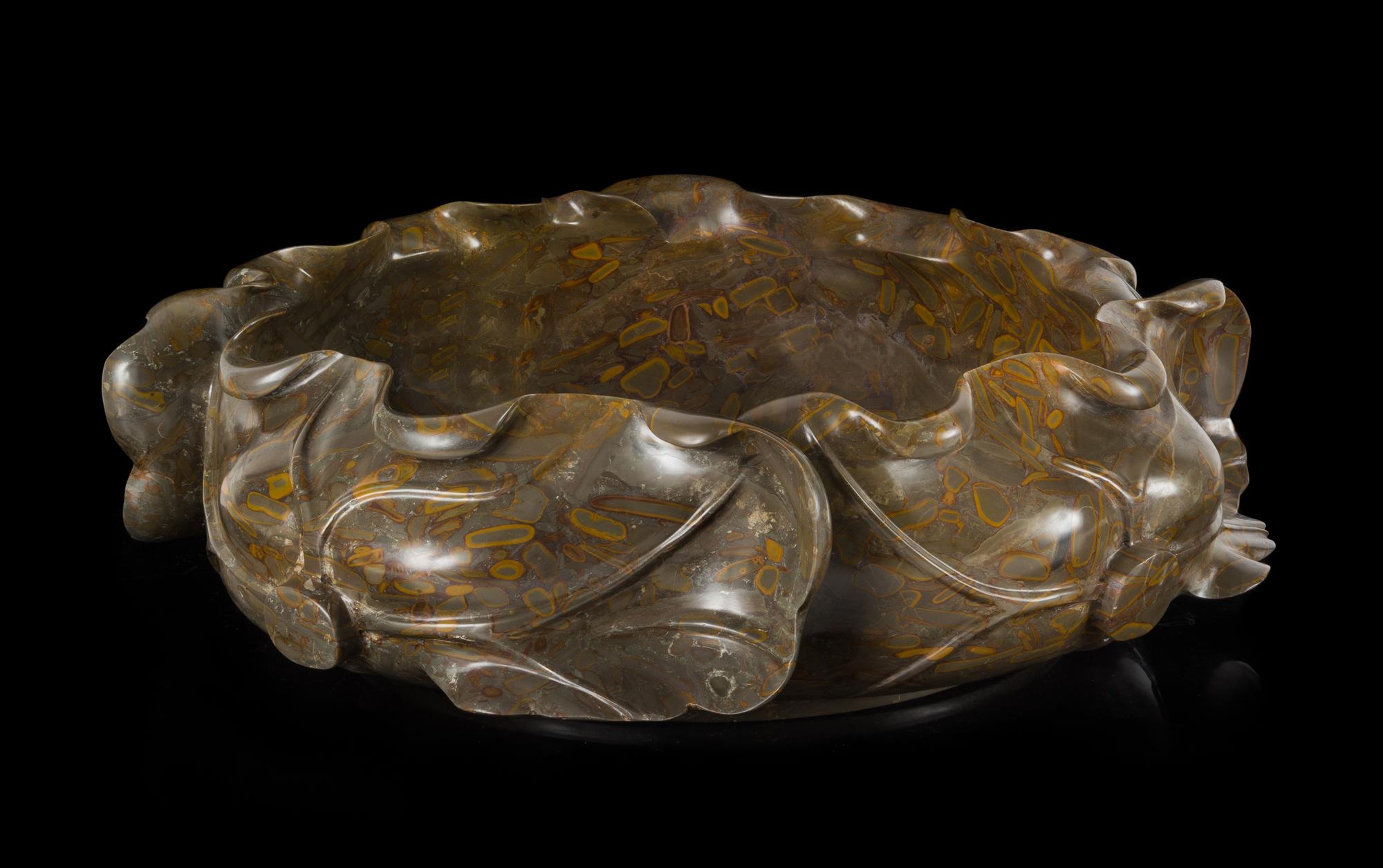 A Large Pudding Stone Washer Diameter 22 inches.