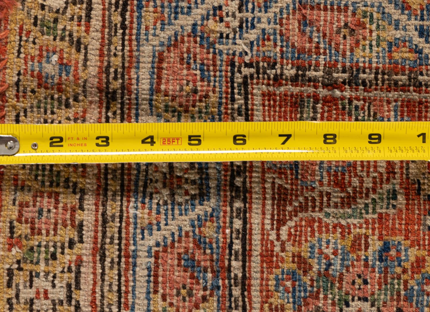 A Kashan Wool Rug