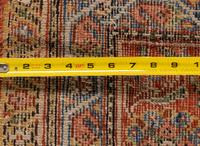 A Kashan Wool Rug
