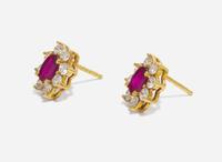 A Pair of 18K Yellow Gold, Ruby, and Diamond Studs