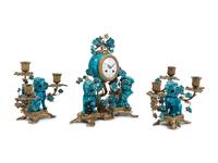 A Louis XV Style Gilt Bronze and Porcelain Clock Garniture