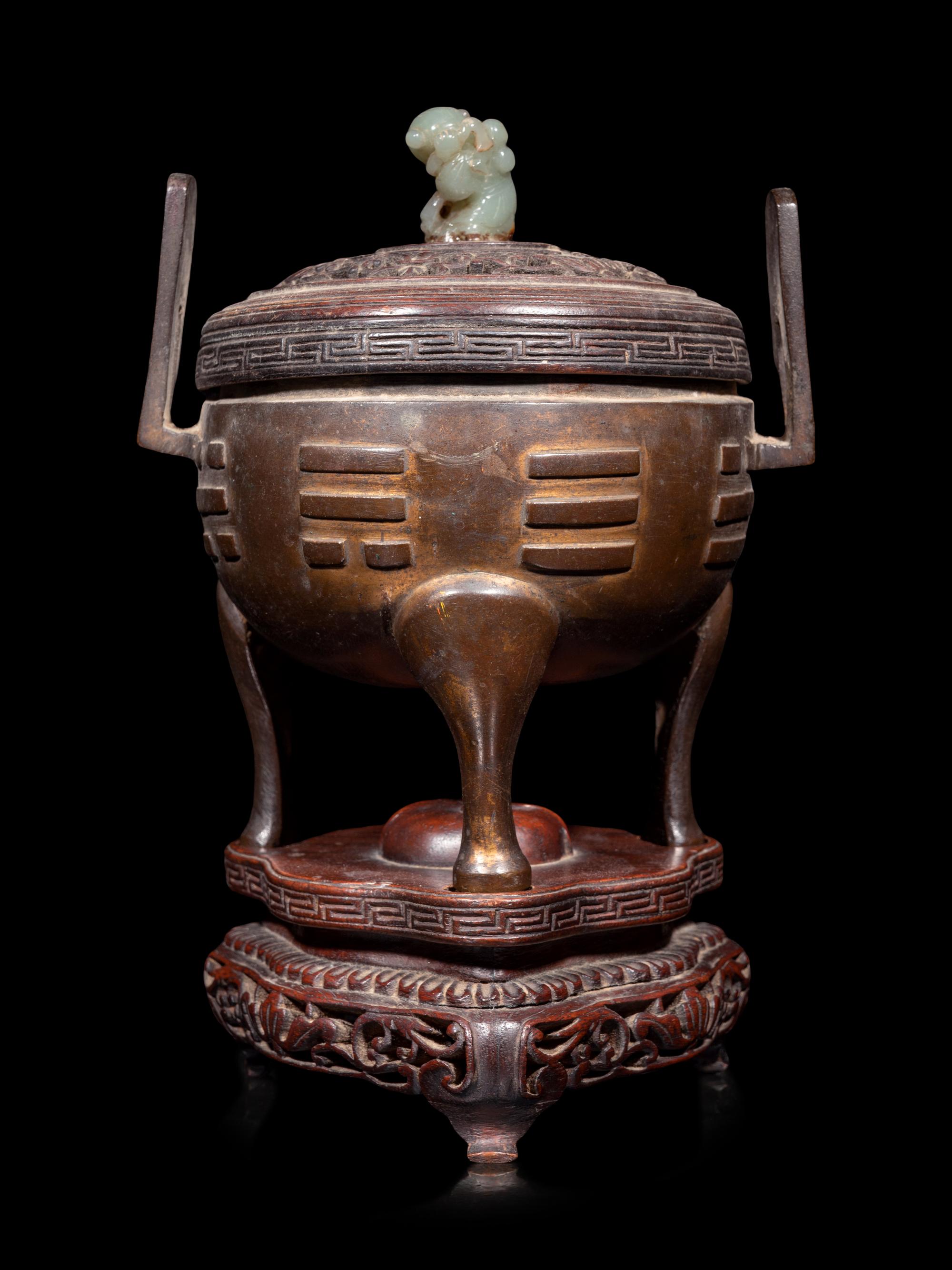 A Chinese Cast Bronze Tripod Incense Burner