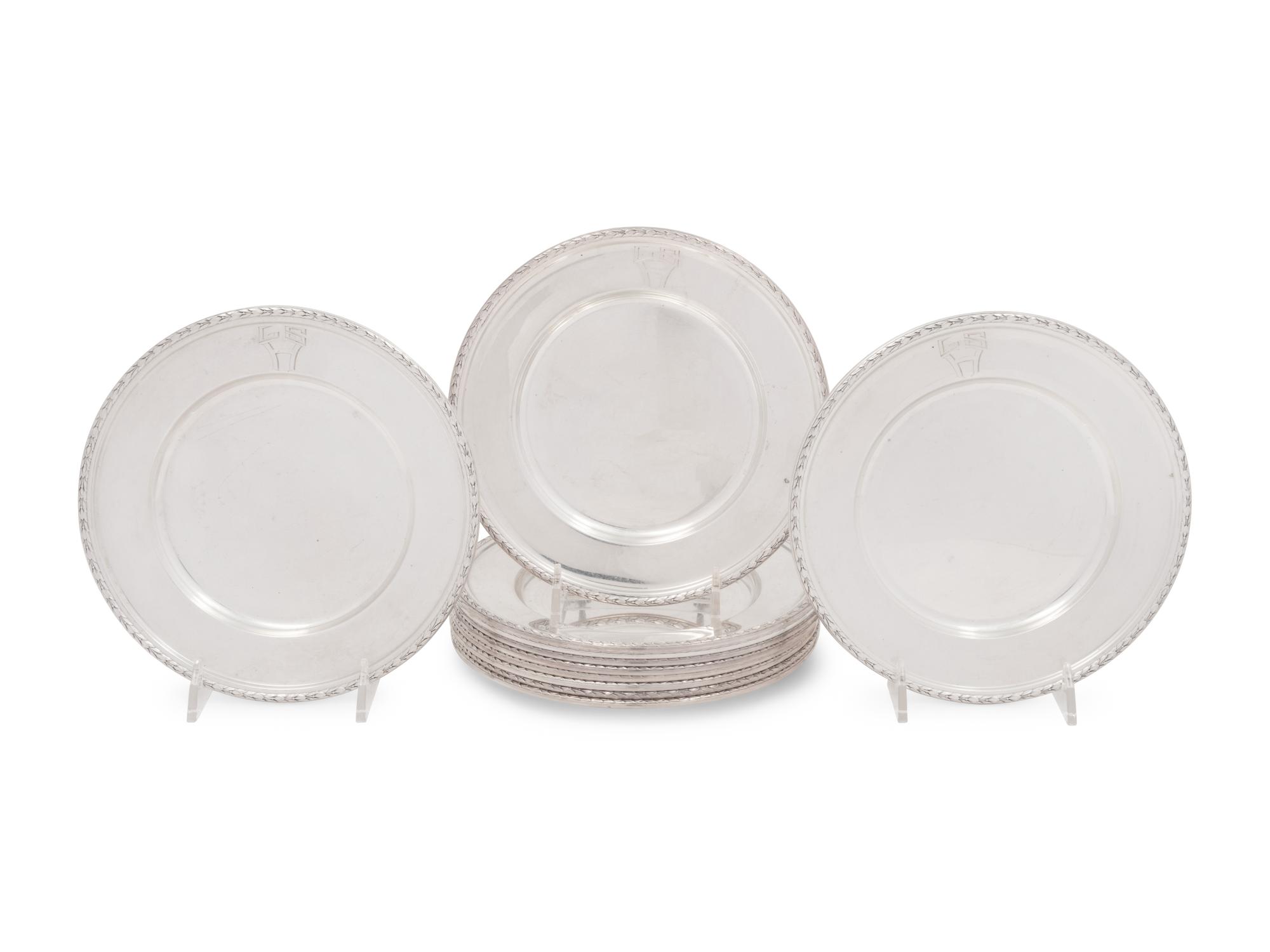 A Set of Twelve American Silver Bread Plates