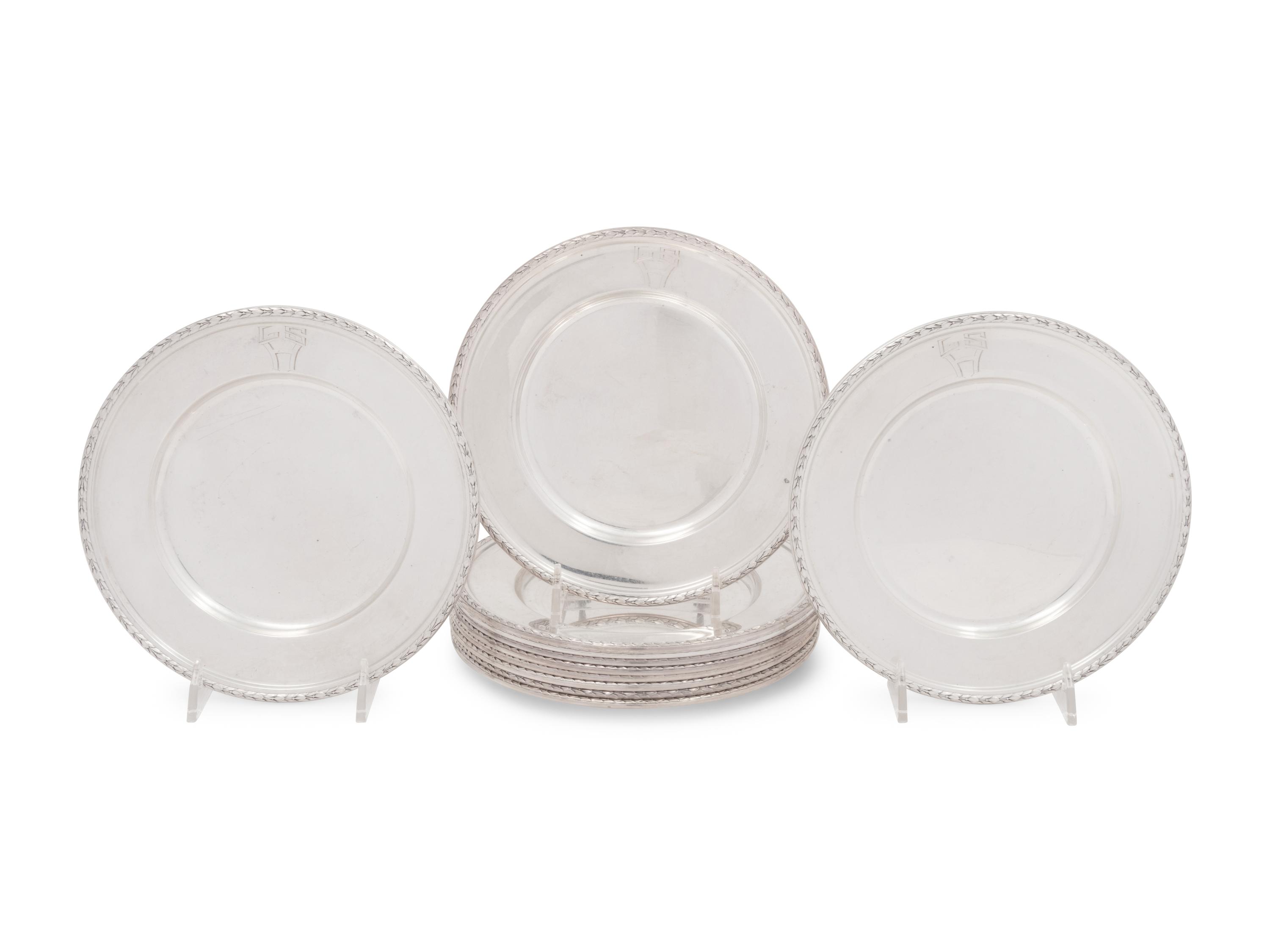 A Set of Twelve American Silver Bread Plates
