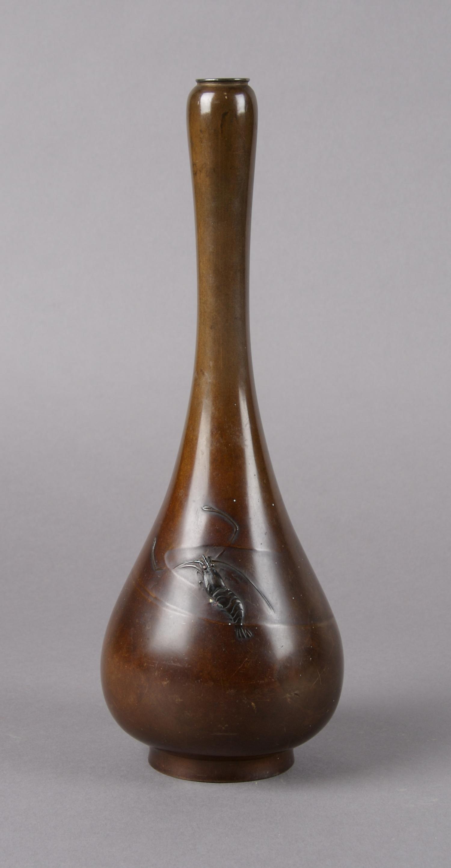 A Japanese Bronze Bottle Form Vase, Height 10 5/8 inches.