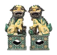 A Pair of Chinese Famille Verte Porcelain Figures of Fu Lions