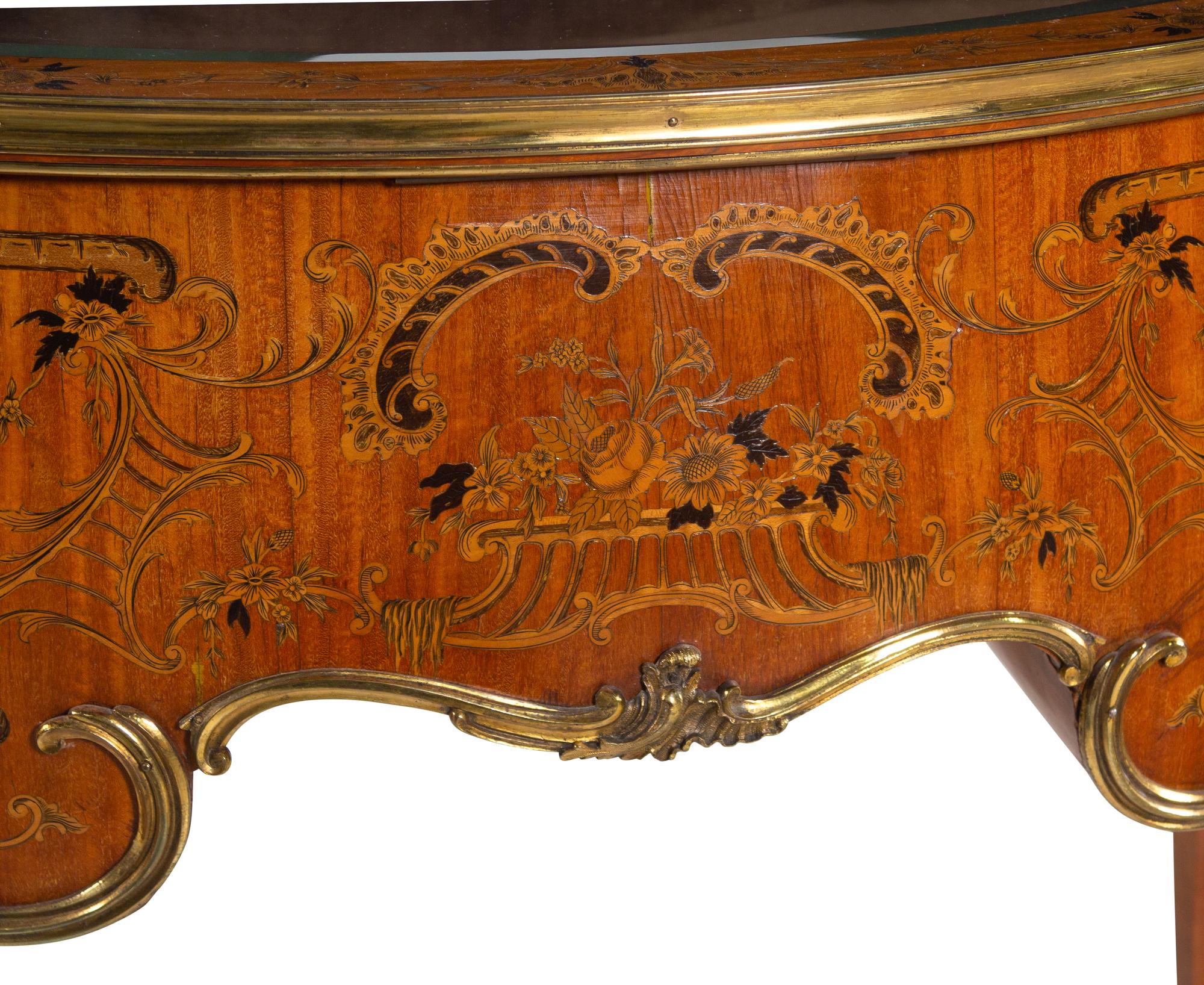 A Louis XV Style Gilt Bronze Mounted Penwork and Marquetry Vitrine Commode