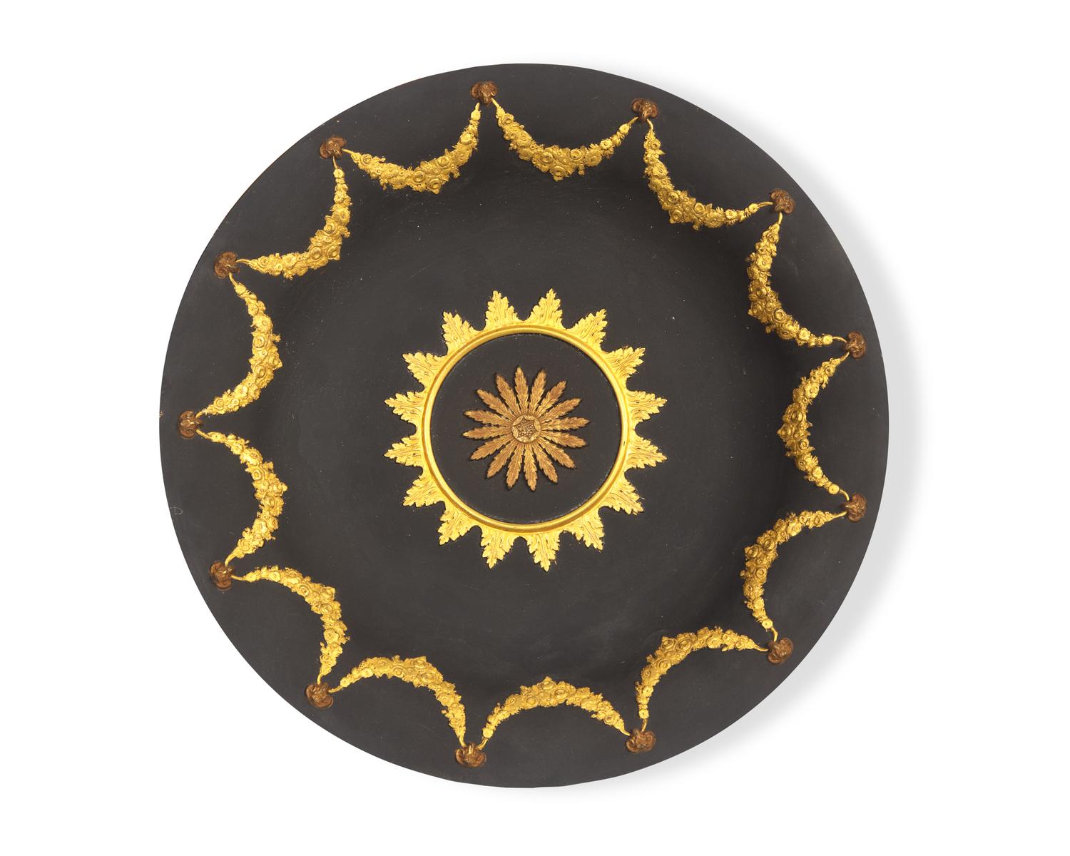 A Wedgwood Neoclassical Parcel-Gilt Black Jasperware Plate