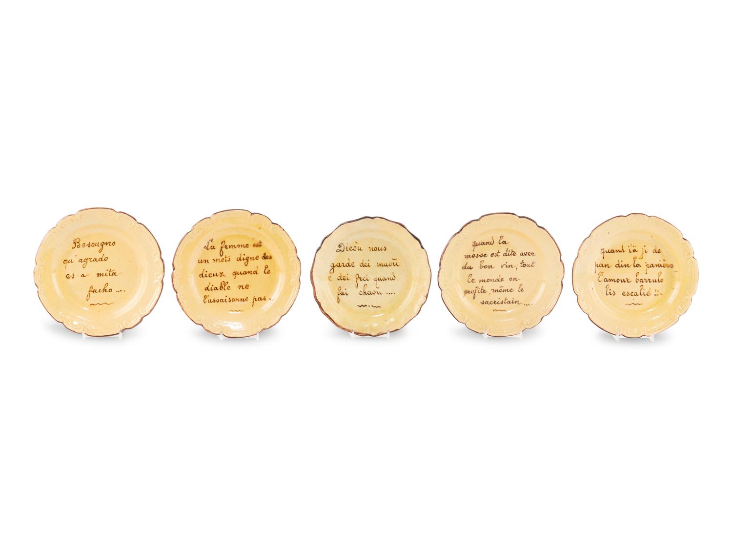 A Set of Five French Glazed Earthenware Plates