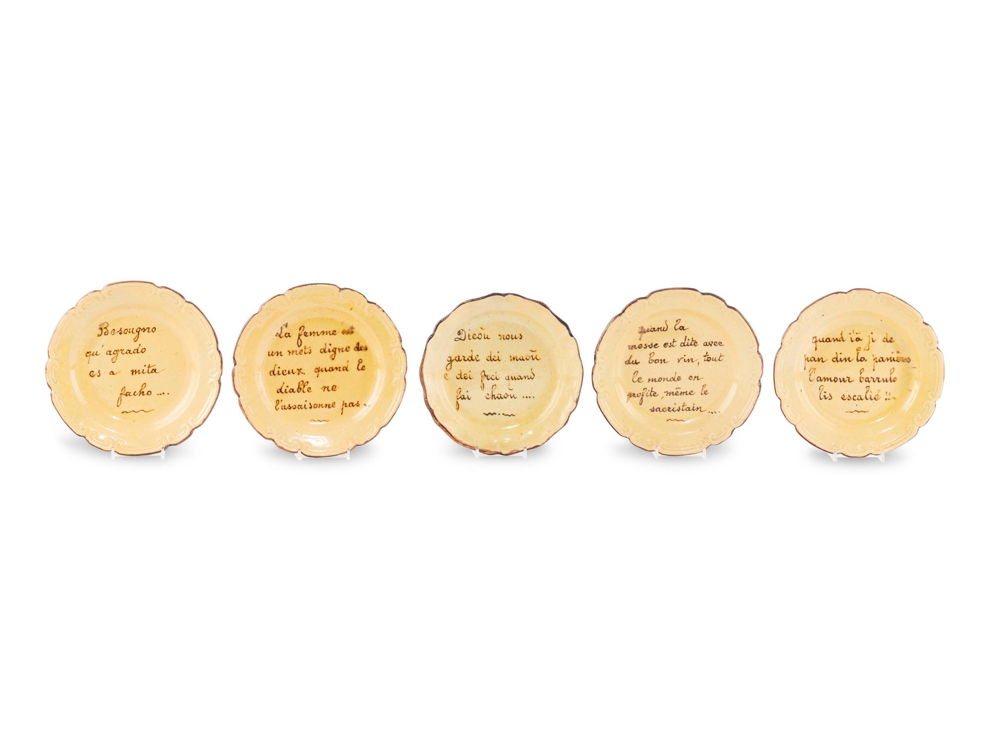 A Set of Five French Glazed Earthenware Plates