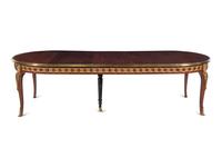 A Louis XVI Style Gilt Bronze Mounted Parquetry Dining Table