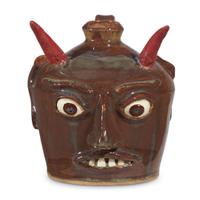 Group of five glazed stoneware face jugs and one figure various artists, Southern States, late 20th century