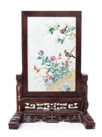 A Famille Rose Porcelain Inset Hardwood Table Screen Height 17 x width 11 1/2 inches.