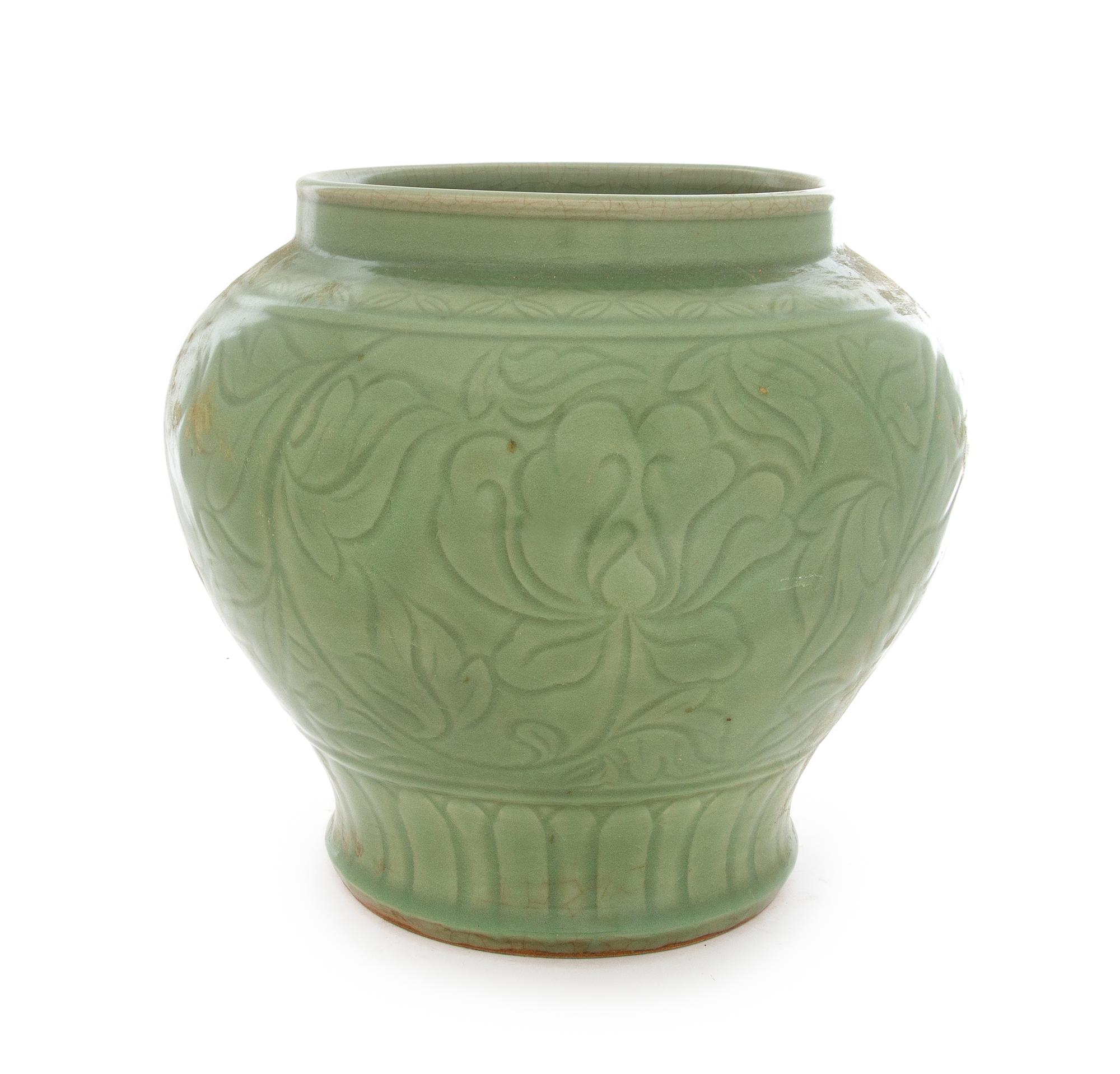 A Large Longquan Celadon Glazed Porcelain Jar Height 11 3/4 inches. — POSSIBLY MING DYNASTY (1348-1644)