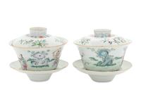 A Pair of Famille Rose Porcelain 'Boys' Covered Bowls and Stands