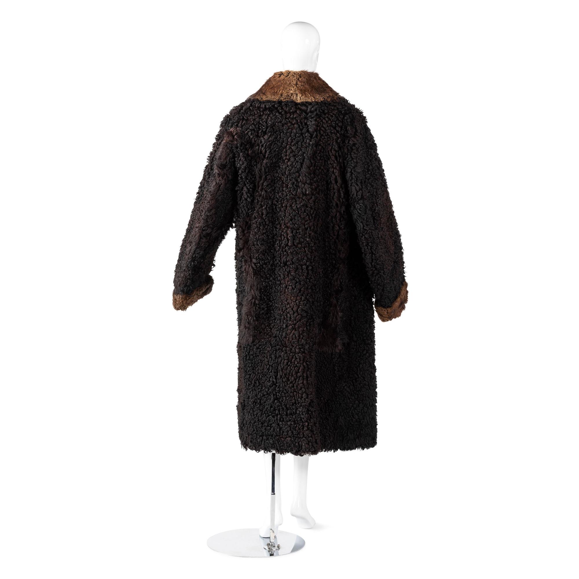 [WESTERN AMERICANA]. Buffalo coat with gauntlets.
