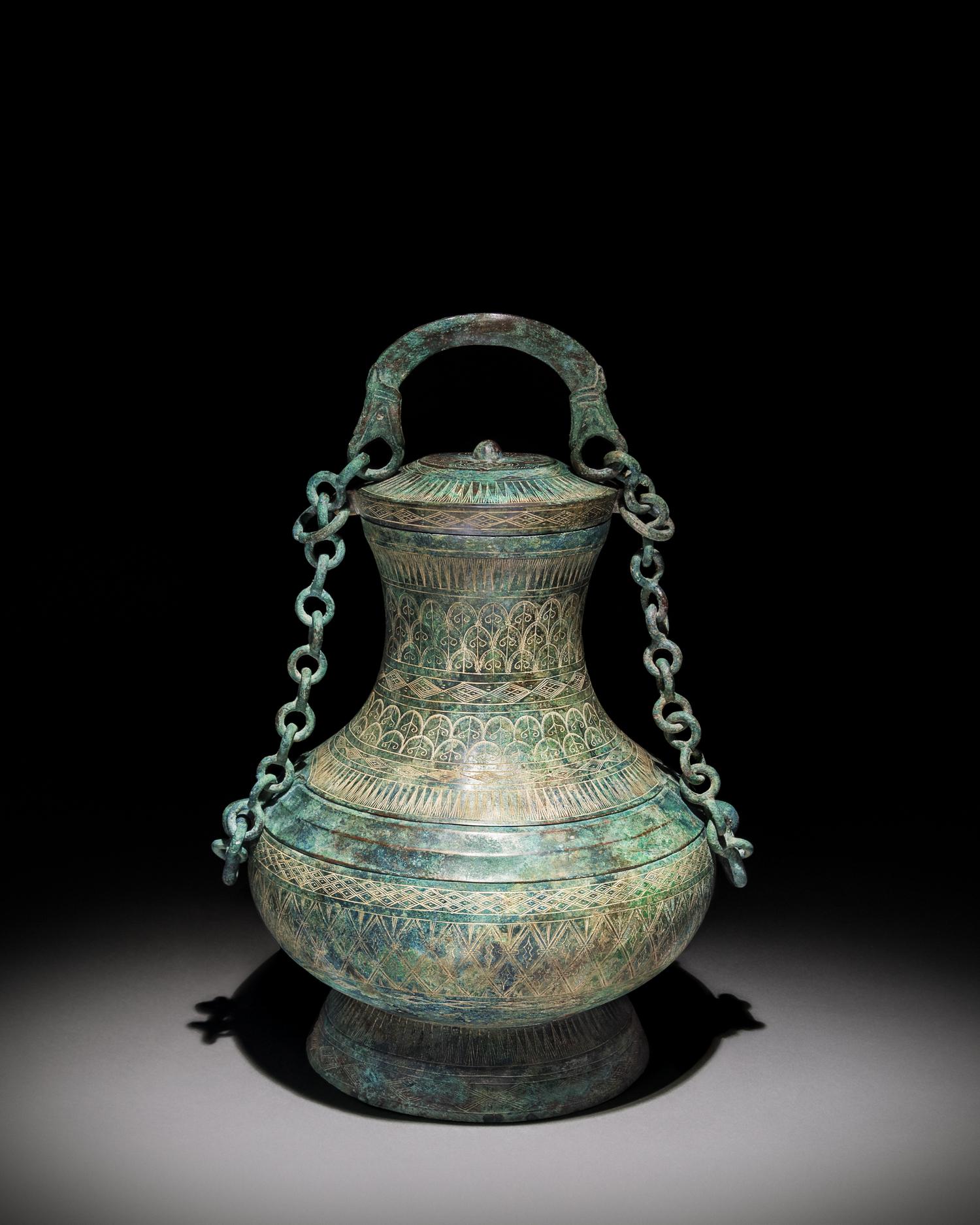 An Archaic Bronze Ritual Wine Vessel, Tilianghu Height 12 1/2 x width 9 1/2 inches. — EASTERN HAN DYNASTY (25-220)