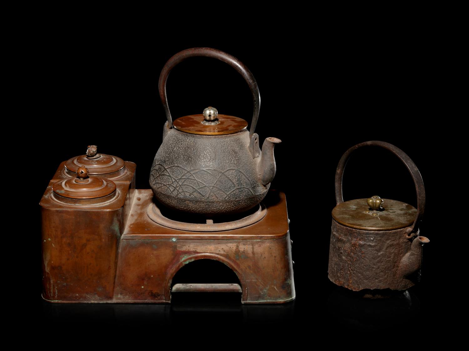 Four Japanese Cast Iron Teapots, Tetsubin , and Copper Burner Stand