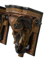 A Pair of Painted and Parcel Gilt Earthenware Elephant-Form Wall Brackets