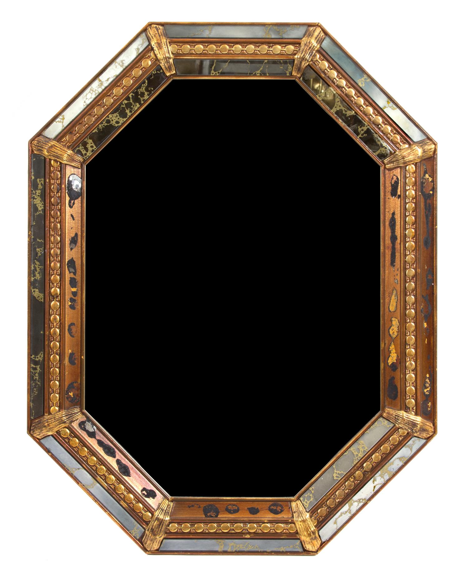 A Continental Cushion Giltwood Framed Octagonal Mirror Height 36 x width 27 inches. — 20TH CENTURY