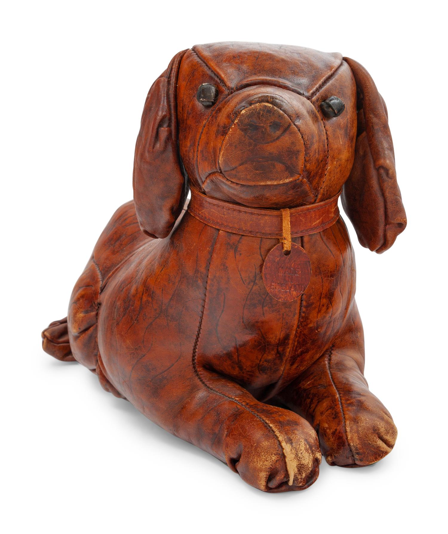 An Omersa & Co. Leather ‘Puppy’ Foot Stool