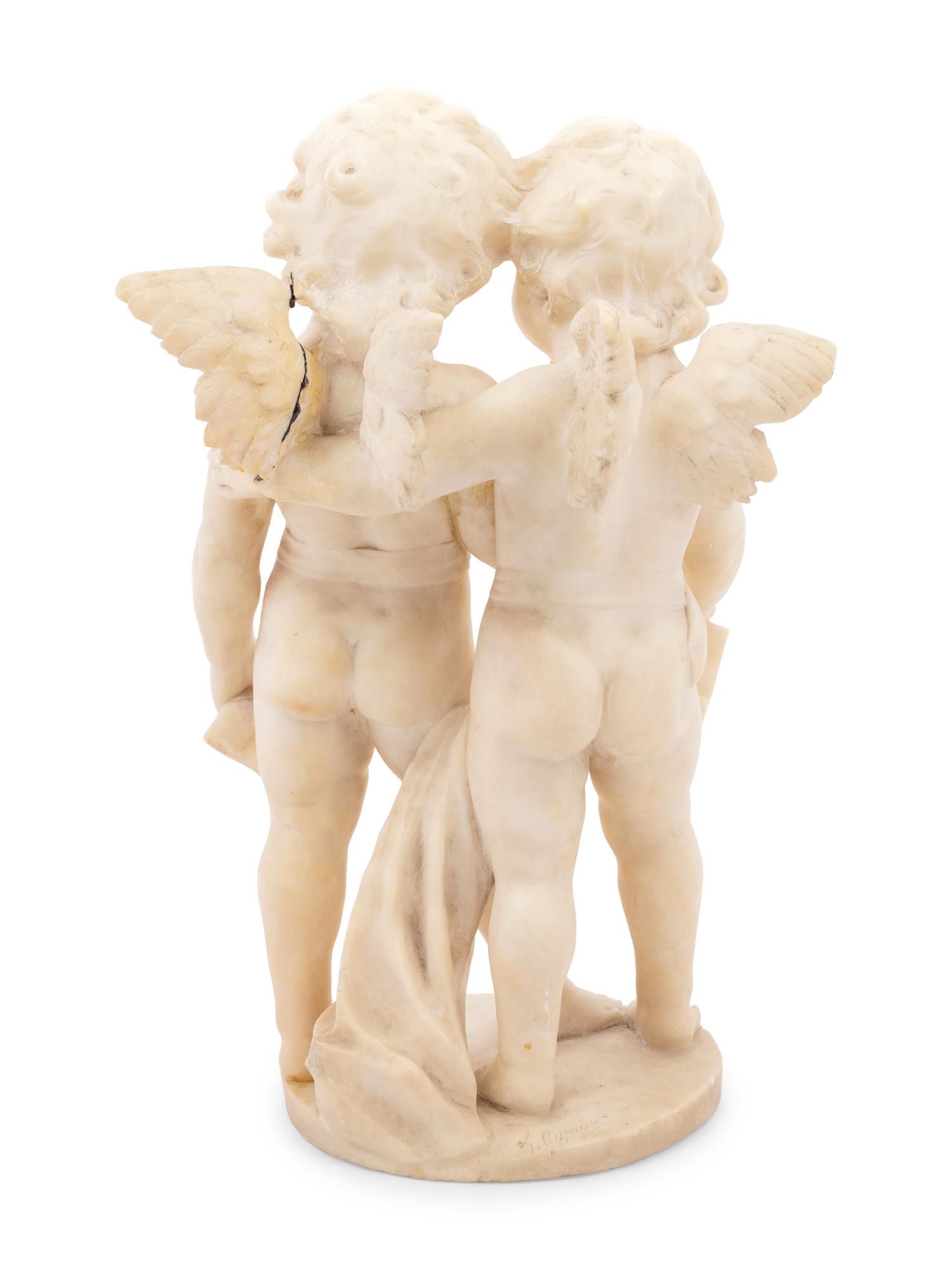 A Carved Marble Figure of Two Putti